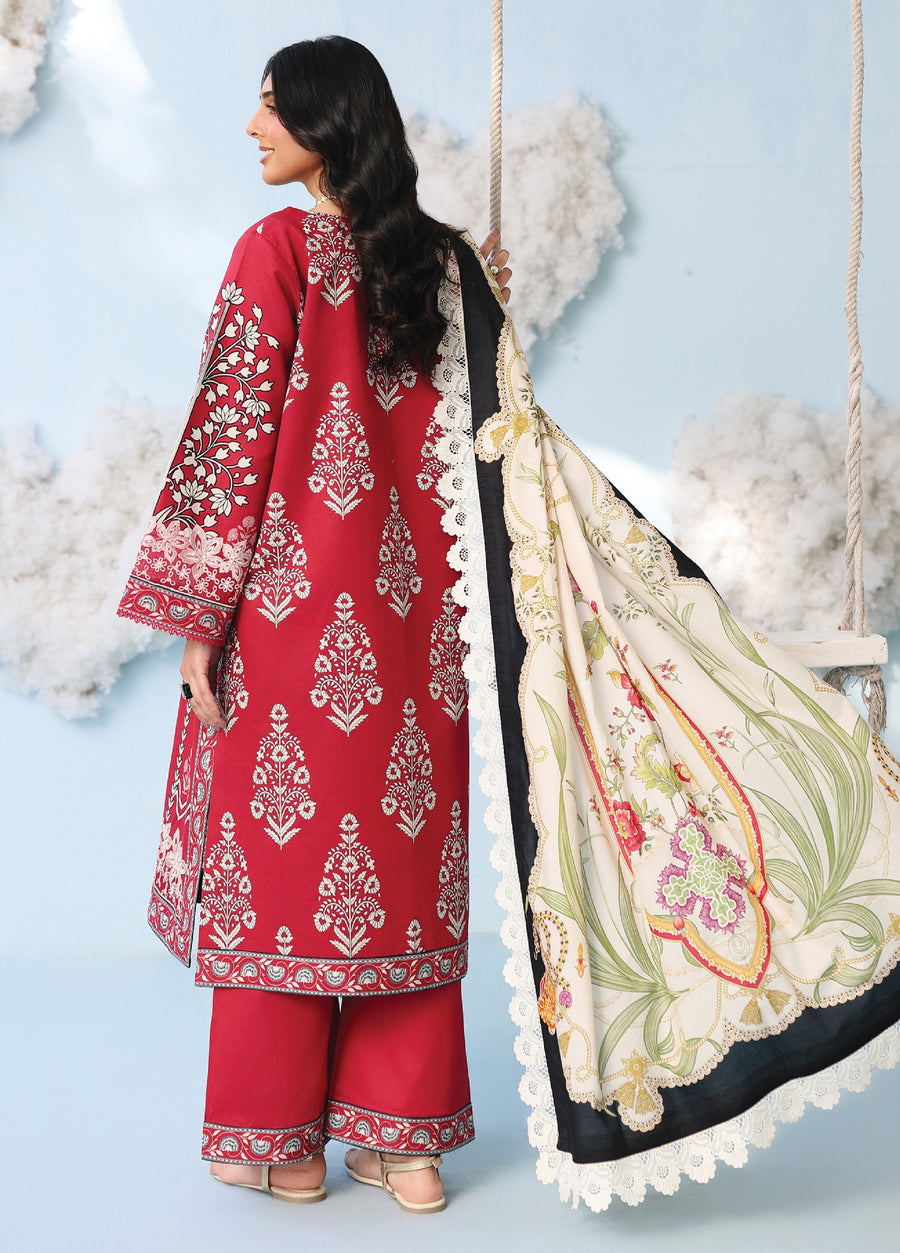 Back view of woman in red embroidered lawn suit showcasing detailed floral embroidery and a flowing printed dupatta with lace trim