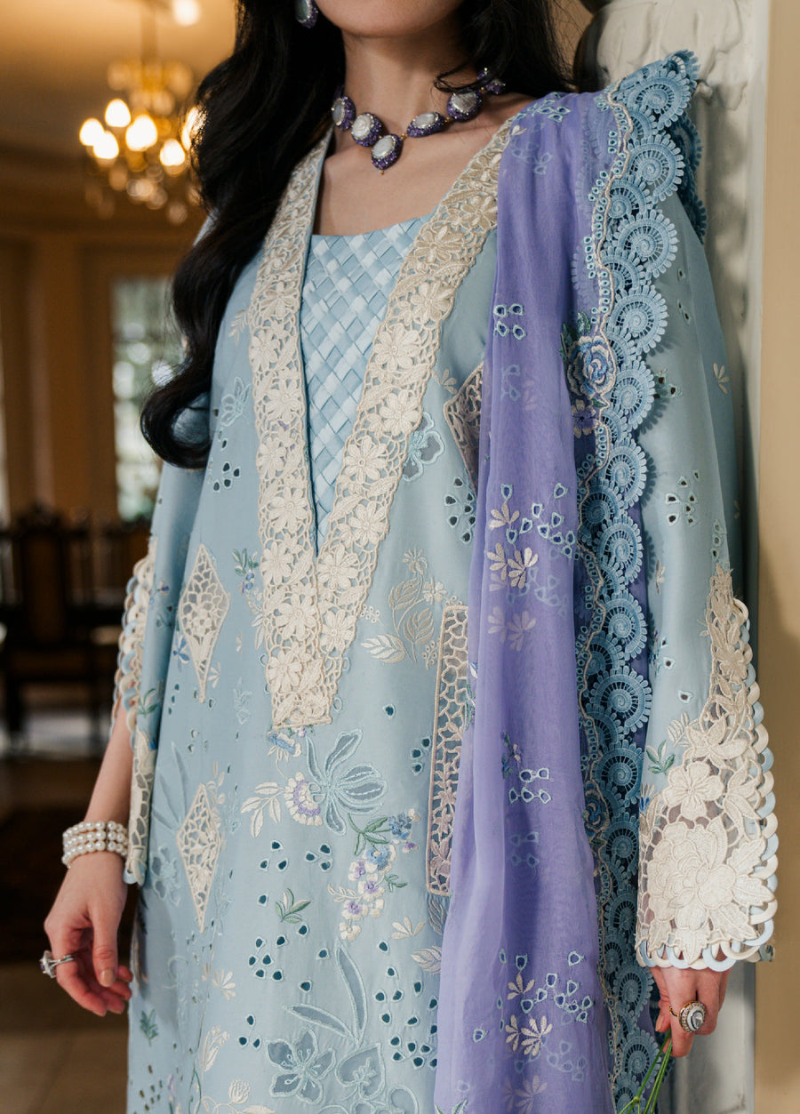 Side shot showing embroidered sleeve detail and scalloped lace edge on lavender dupatta draped over woman’s arm