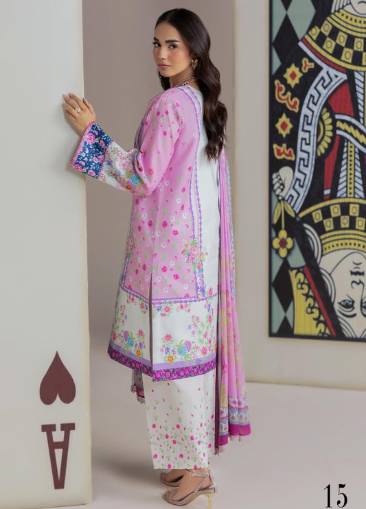 Side view of a woman showcasing the back and side details of the pink and white floral printed lawn suit with coordinating dupatta and tapered printed trousers.