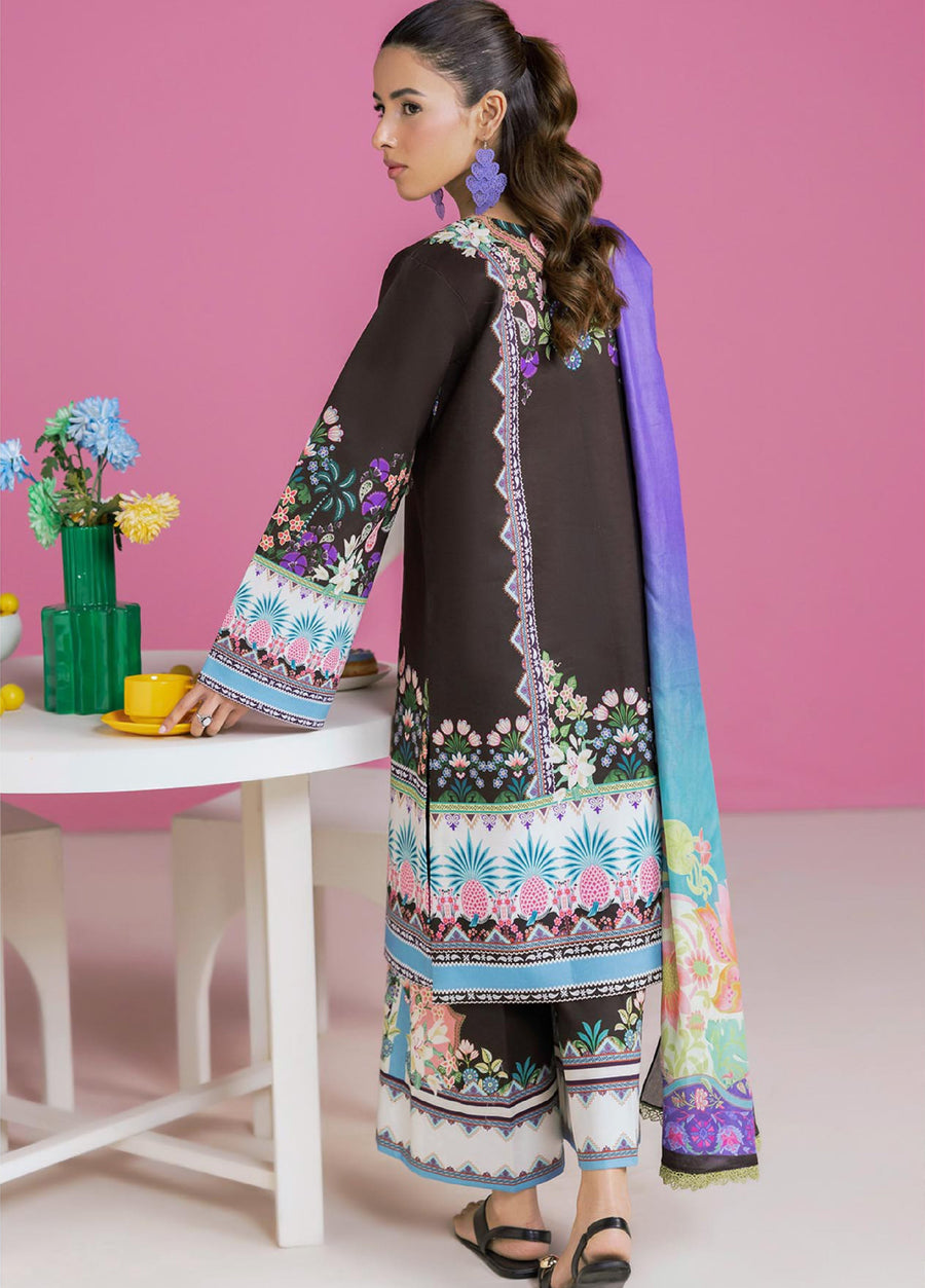 Back view of woman showing full sleeve floral print lawn shirt and matching printed trousers with colorful lawn dupatta draped over shoulder