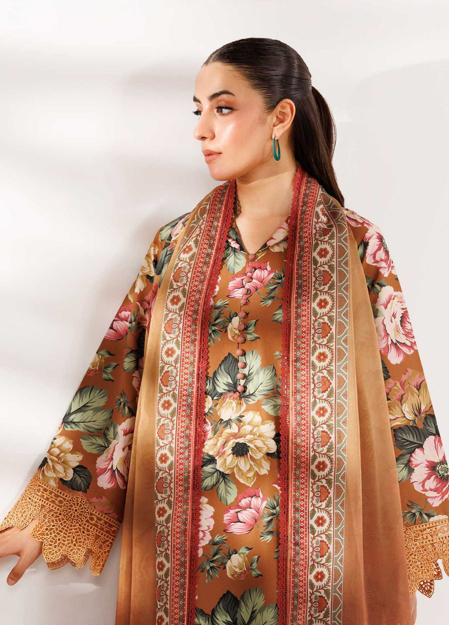 Close-up of the embroidered floral lawn shirt with ornate organza and silk dupatta detailing and scalloped sleeve edges