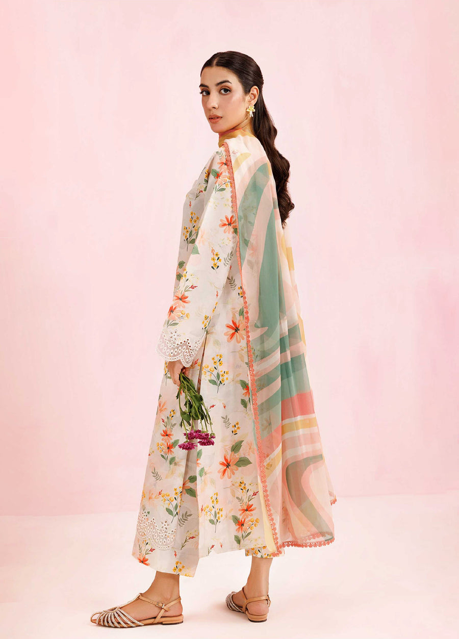 Side view of the floral embroidered lawn suit showing the multicolor chiffon dupatta and intricate lace details at the hem