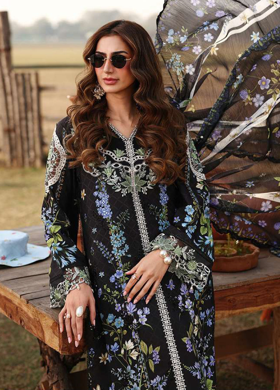 Close-up of the upper half of the floral embroidered lawn suit with detailed view of embroidery and fabric texture.