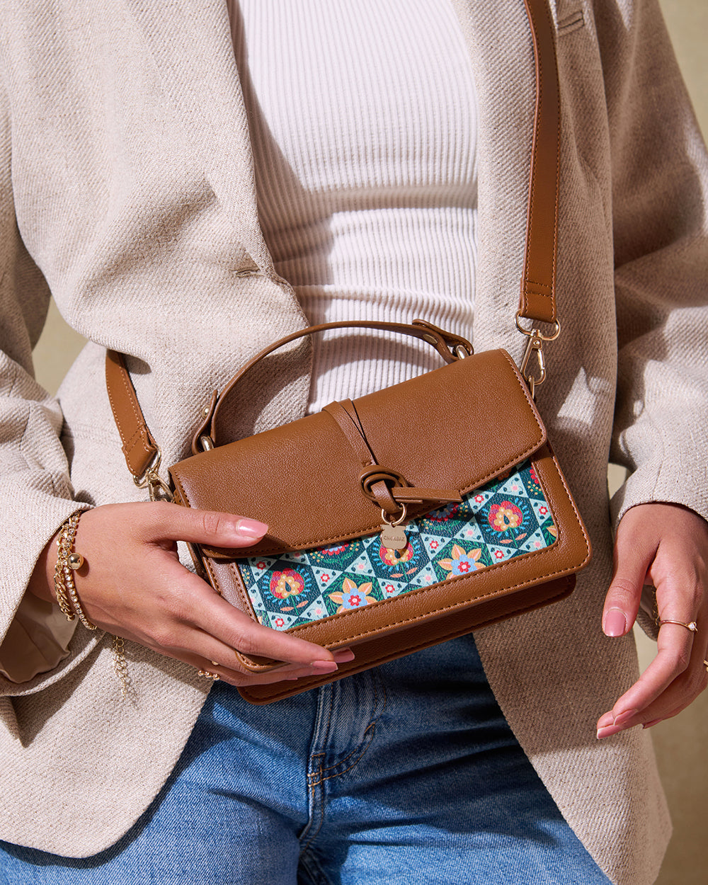 Elegant Brown Leather Crossbody Bag with Embroidery
