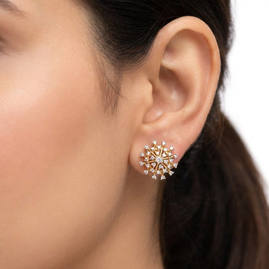 Starburst crystal stud earring worn on ear showing size and elegant sparkle on woman