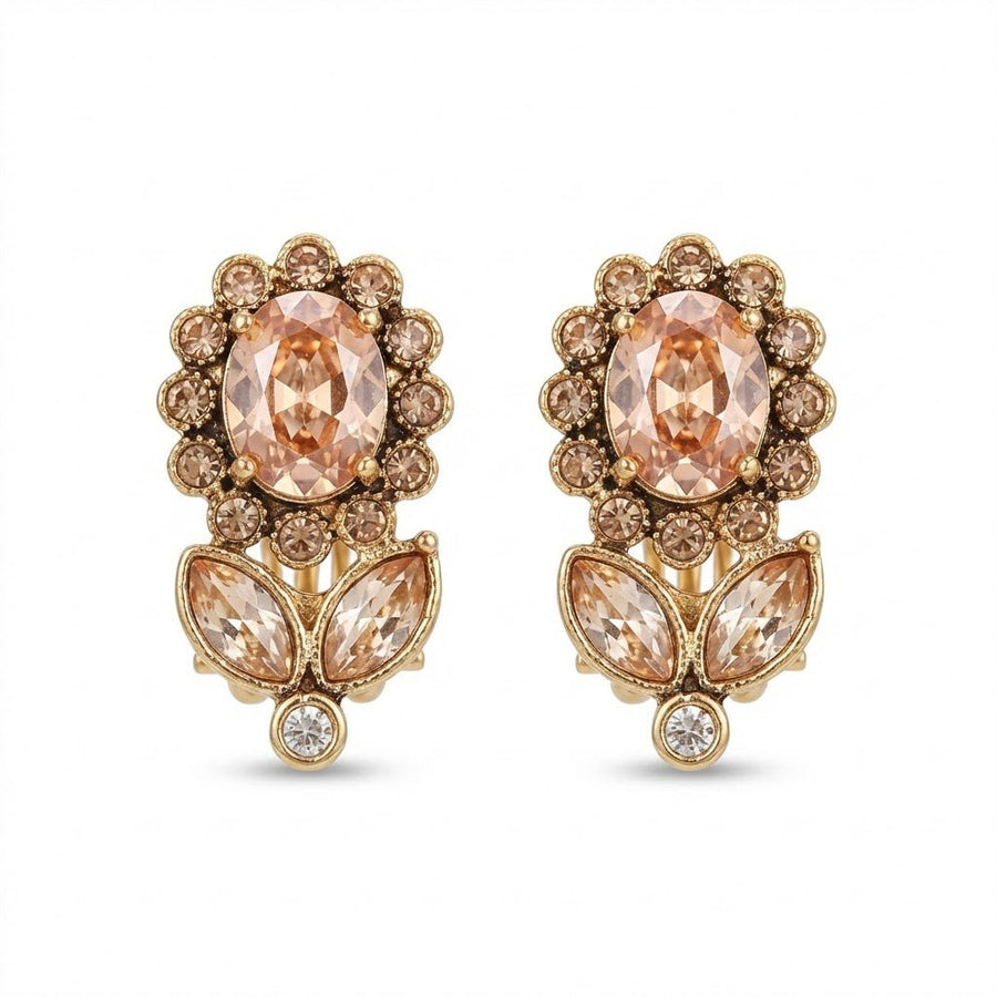 Pair of gold-tone floral earrings with central oval peach crystal surrounded by smaller round crystals, marquise peach crystals and a clear crystal drop