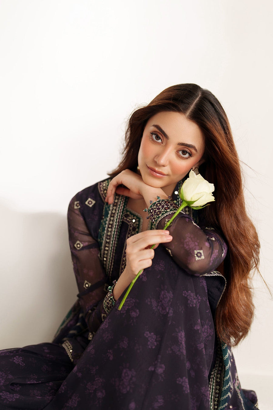 Close-up side view showing embroidery details on sheer sleeves and dupatta border