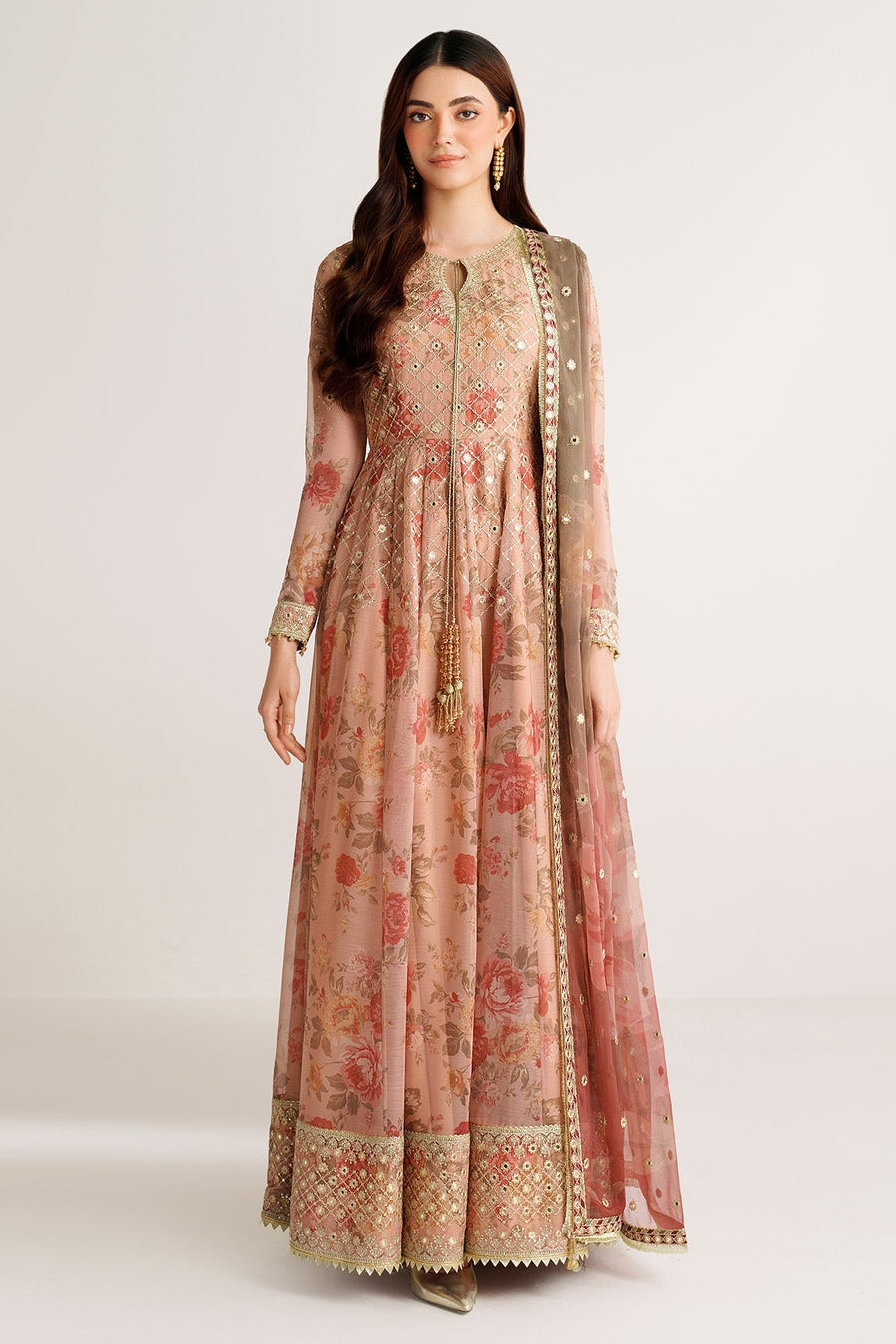 Close-up of keyhole neckline and intricate gold embroidery on embroidered peach chiffon Anarkali suit