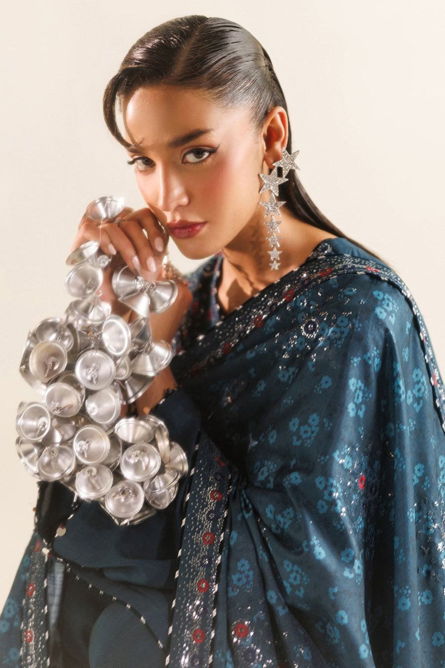 Woman showcasing elegant army green embroidered dupatta with tiny floral patterns and subtle embellishments.