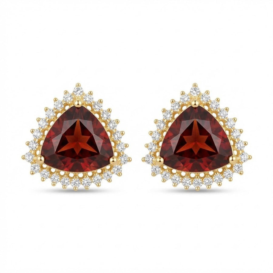 Pair of gold-plated trillion cut deep red gemstone stud earrings with clear halo stones on white background