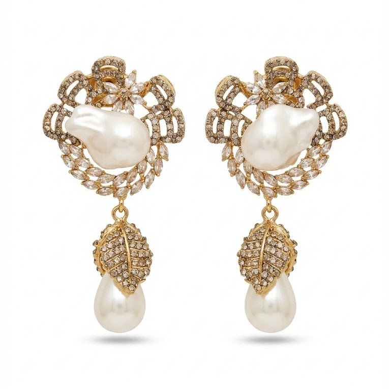 Pair of gold-plated drop earrings with white baroque pearls and clear crystals in floral design
