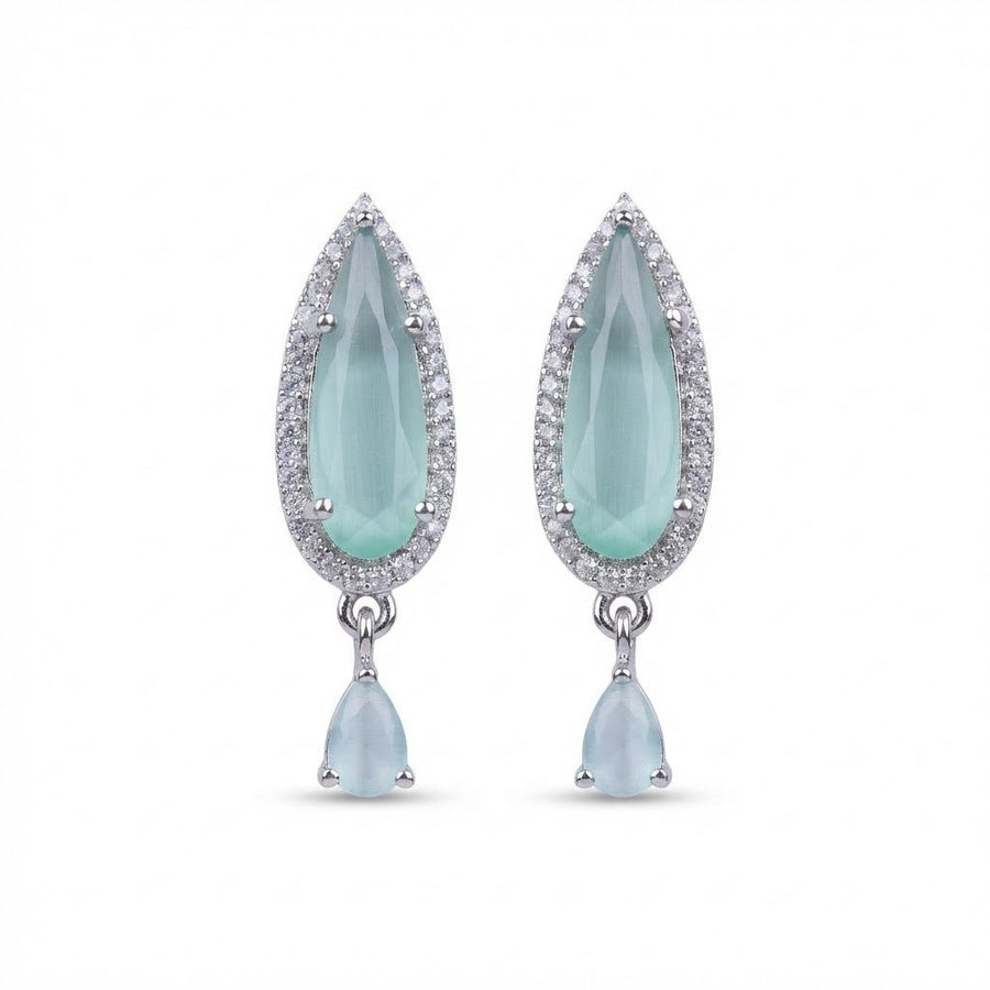 Studio white background image of pale aqua teardrop earrings with clear stone halo and matching dangling stones