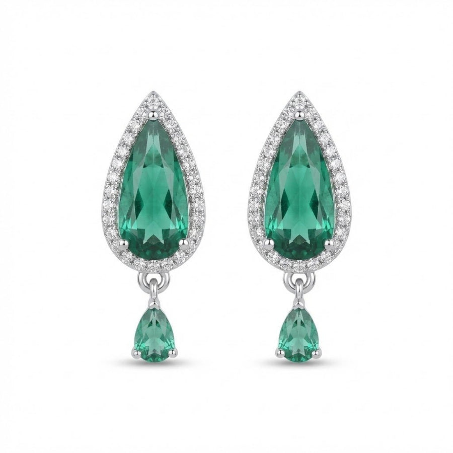 Studio white background image of green teardrop crystal earrings with dangling smaller crystals