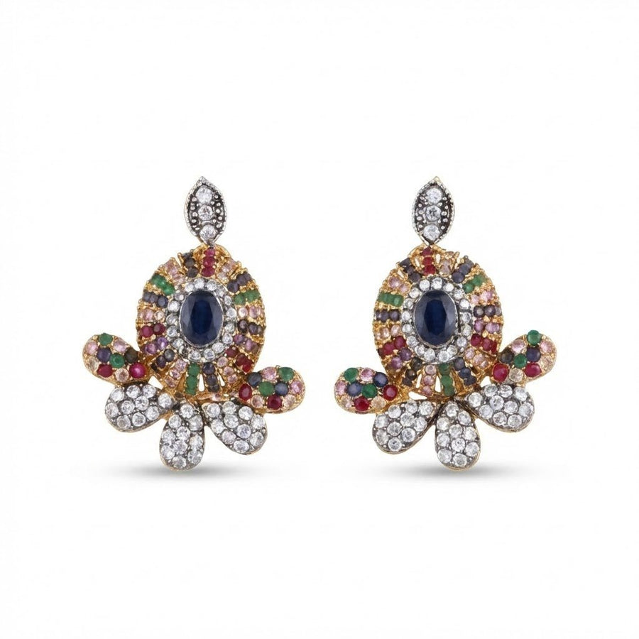 Sapphire blue central gemstone floral stud earrings with diamond and multicolor accents on white background