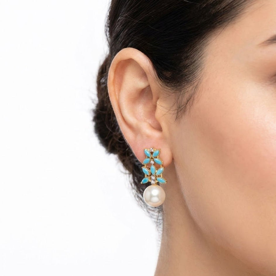 Pearl drop earrings with blue, green, red, beige and black marquise stones photographed on white background