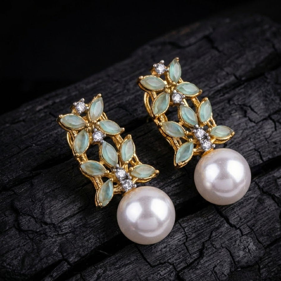 Large smooth pearl drops with pink and beige marquise stones earrings photographed on white background