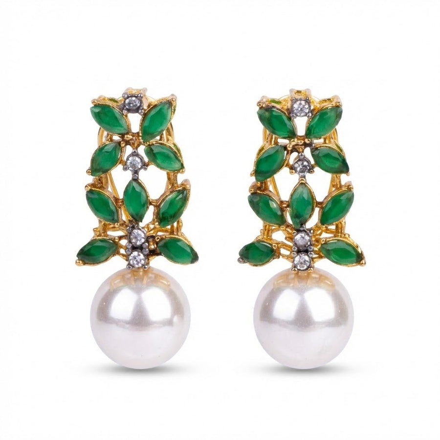 Green stone and pearl gold-tone drop earrings on white background