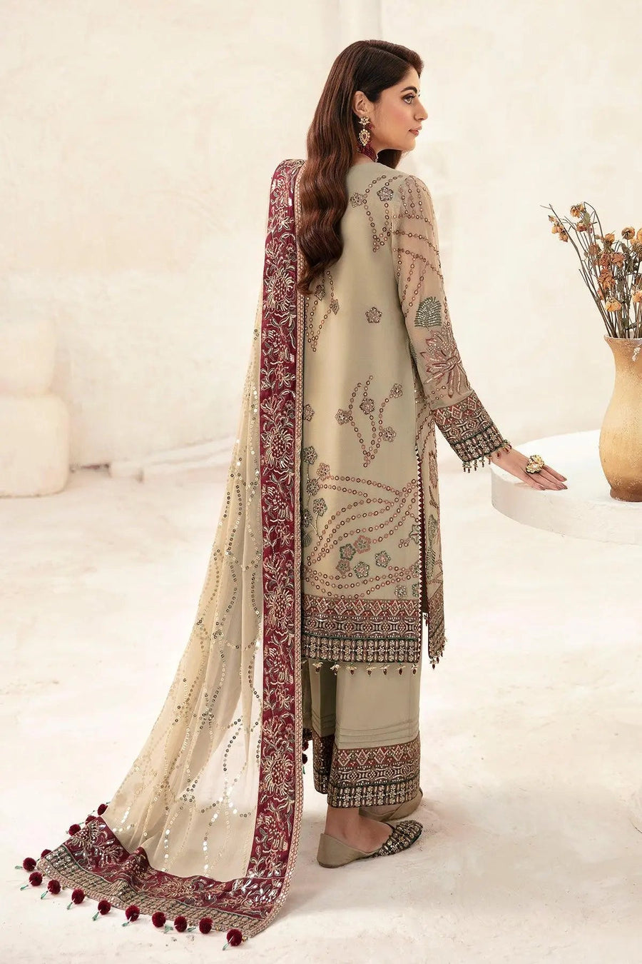 Back view of embroidered chiffon shirt with detailed floral embroidery and matching dupatta