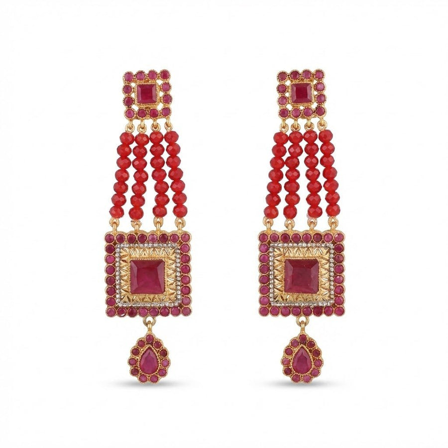 Pair of long red gemstone bead earrings with gold-tone square motifs and teardrop pendants