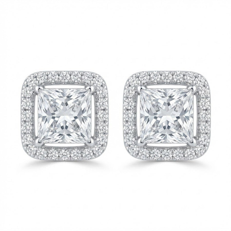 Clear halo stud earrings worn by female model demonstrating size and style in formal look